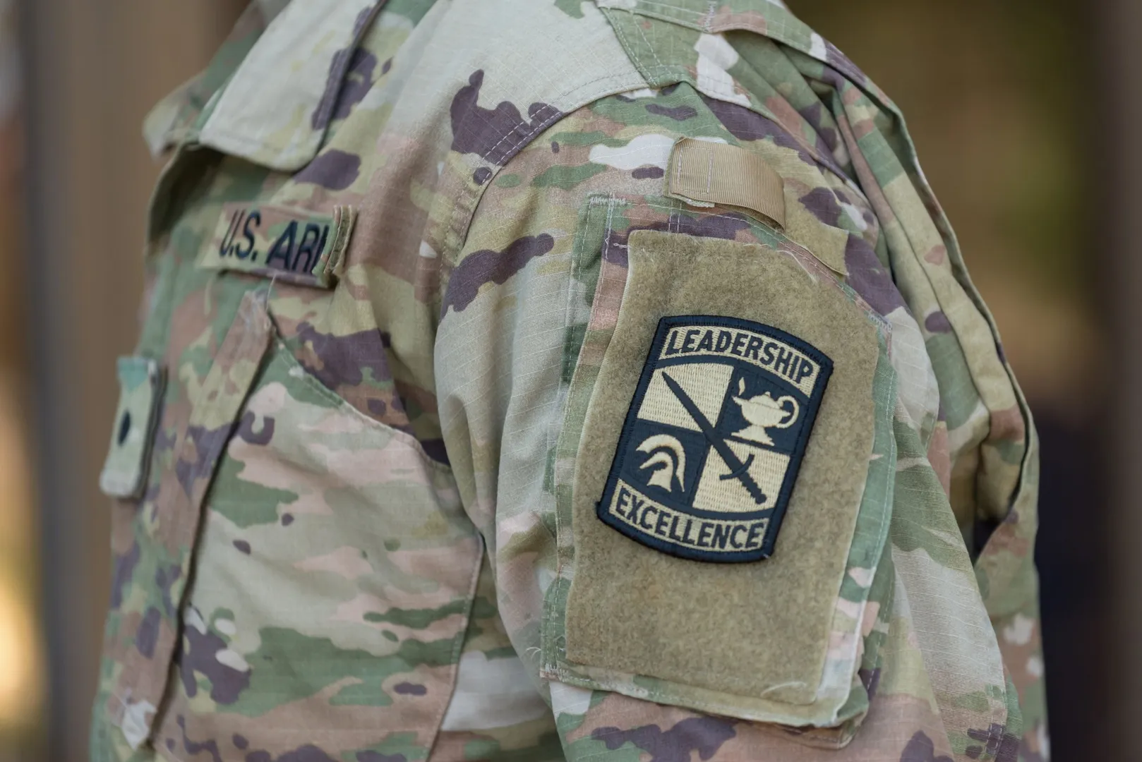 Closeup on a cadet's shoulder patch of the ROTC loge