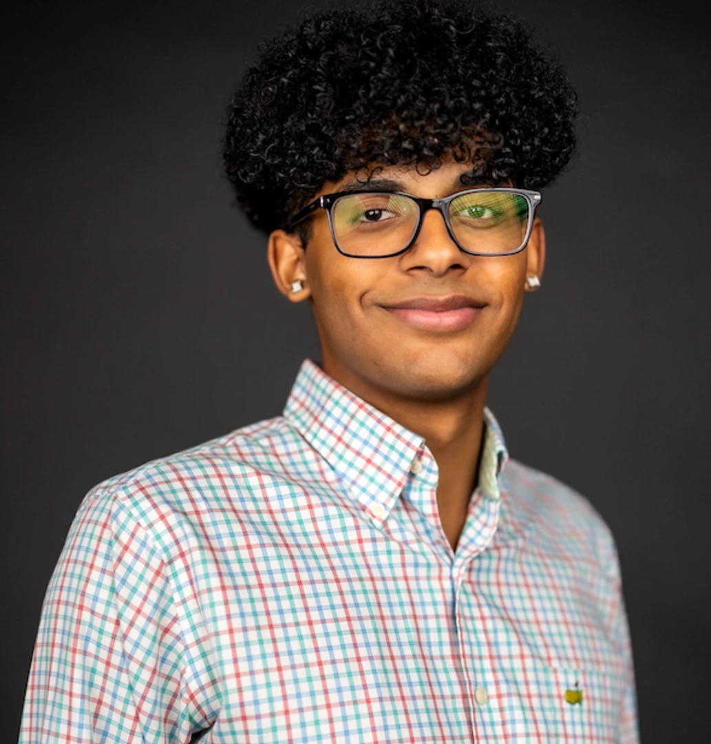 Dumas, a senior business major, applied his skills during an SRNS internship, gaining hands-on experience in business operations and supply chain processes.