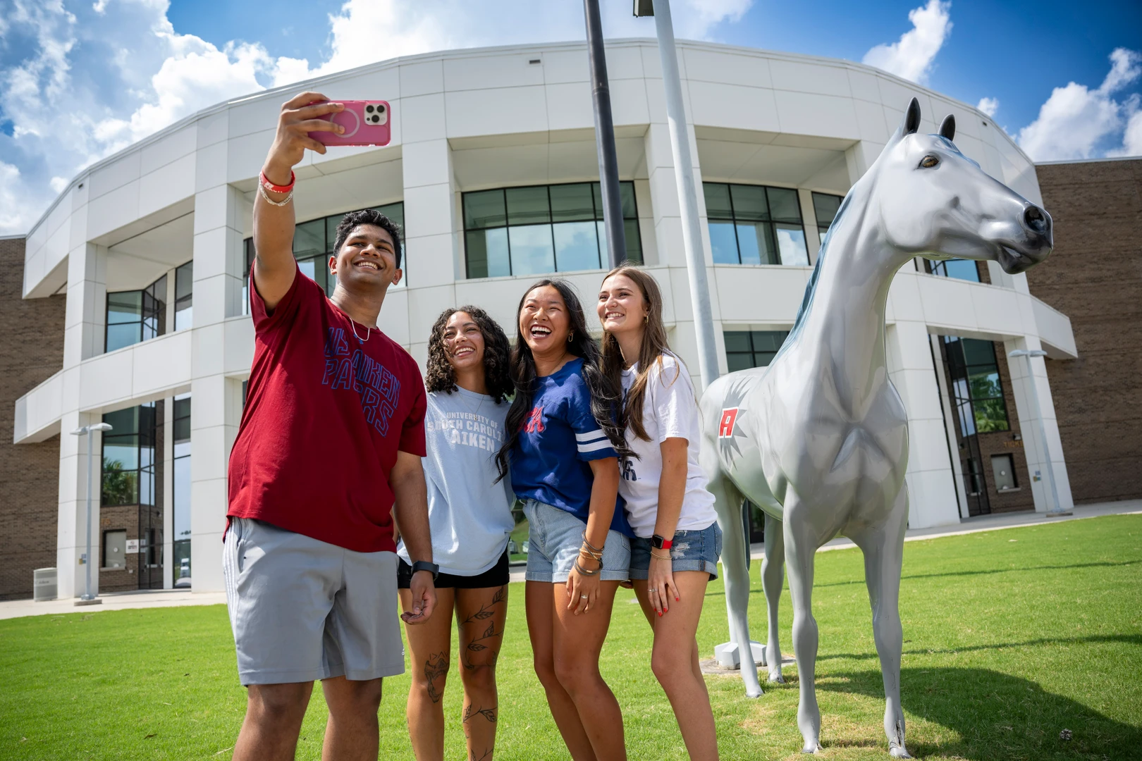 Group of students pose for selfie