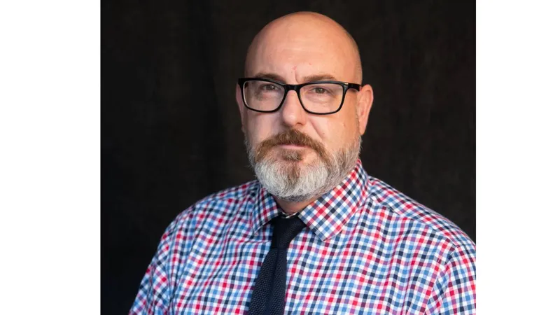 Jason Munsell, Chair of the Department of Communication and Emerging Media