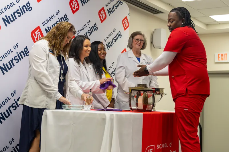 Nursing student Joshua Settles (pictured above) was one of five male students who participated in the Dedication of Hands Ceremony