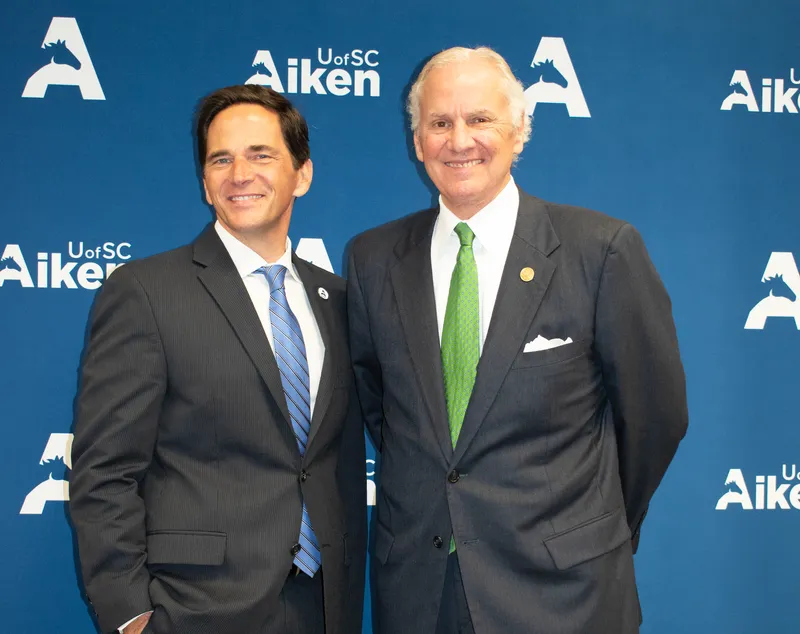 Gov. McMaster stands alongside USCA Chancellor Dan Heimmermann during a visit in 2021