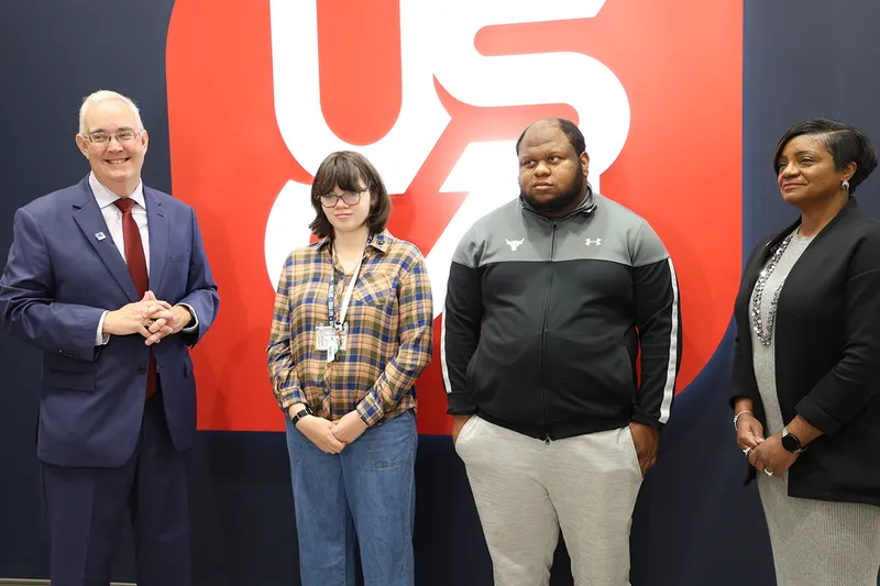 From left to right: William Floyd, S.C. Department of Employment and Workforce Executive Director, USCA LIFE Students Marissa Forger, Chaz Truesdell  and Commissioner Felicia Johnson