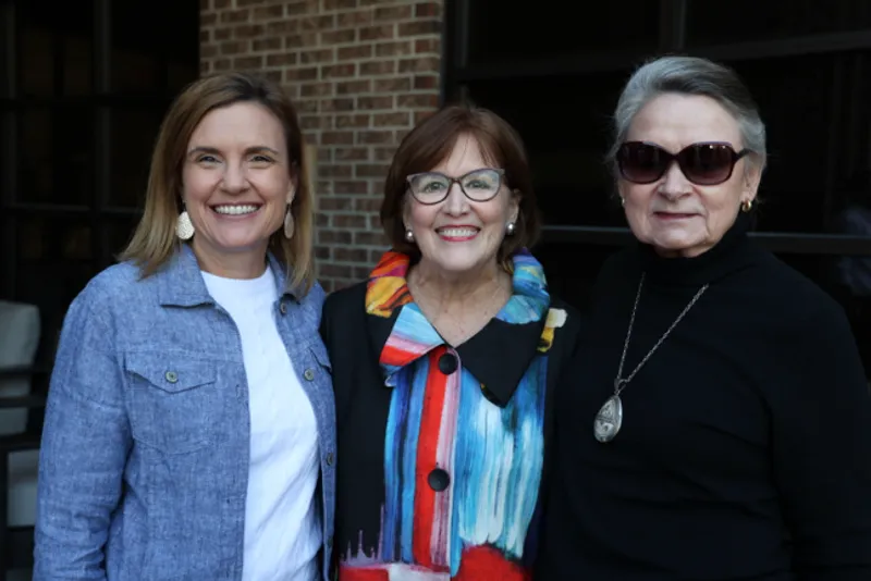 Dean Kate Chargualaf, left, stands next to former School of Nursing Dean Dr. Thayer McGahee, middle, and Dr. Julia Ball during the celebration.
