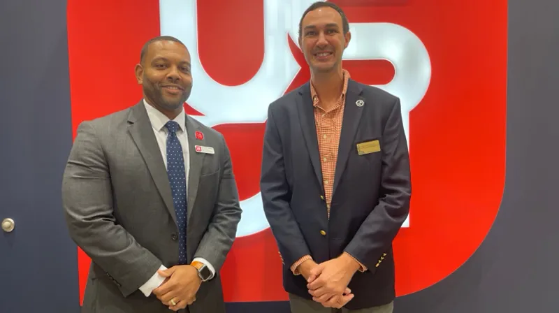 Dr. David Buckman, dean of the School of Education, stands next to Corey Bedenbaugh, SC Teacher of the Year.