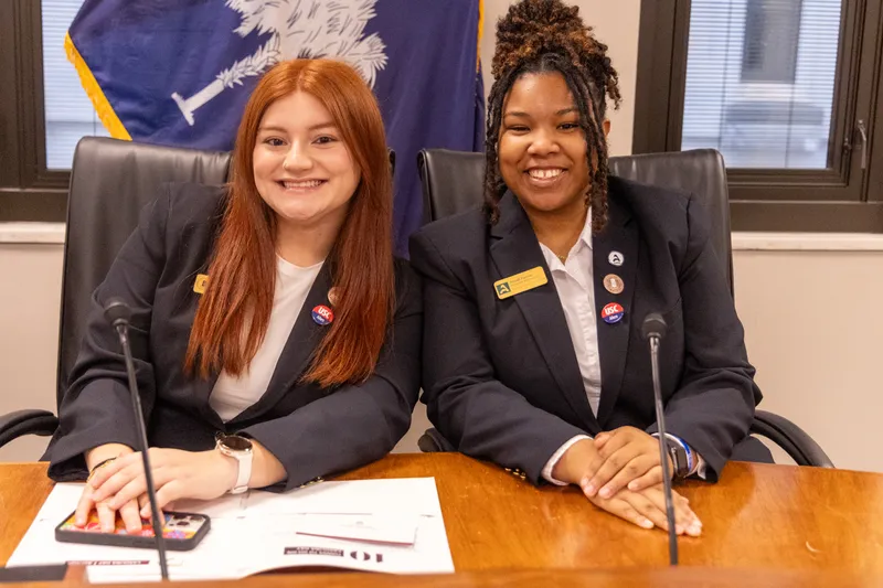 USCA students Katherine Sojo (left) and Anayah Farmer (right) attend Carolina Day at the SC Capitol