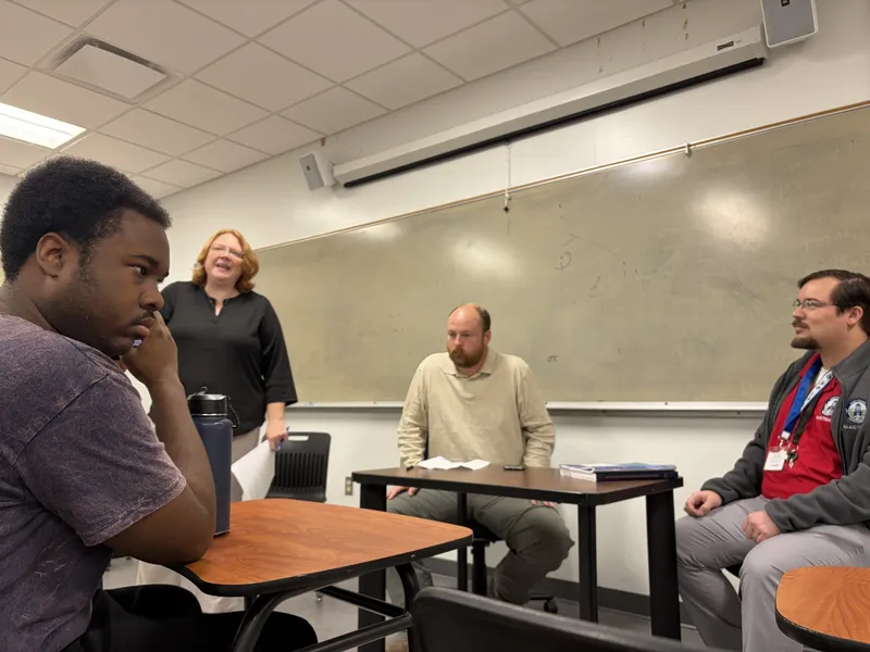 From left, Dr. Sarah Young invites USCA alumni Jacob Nelson, USCA ’18, and Nathan Garner, USCA ’23, to her political science classes, giving students a first-hand look at how concepts discussed in class apply in the real world.
