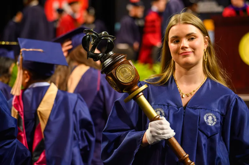 USCA Student Government President Lauren Bell holding an award